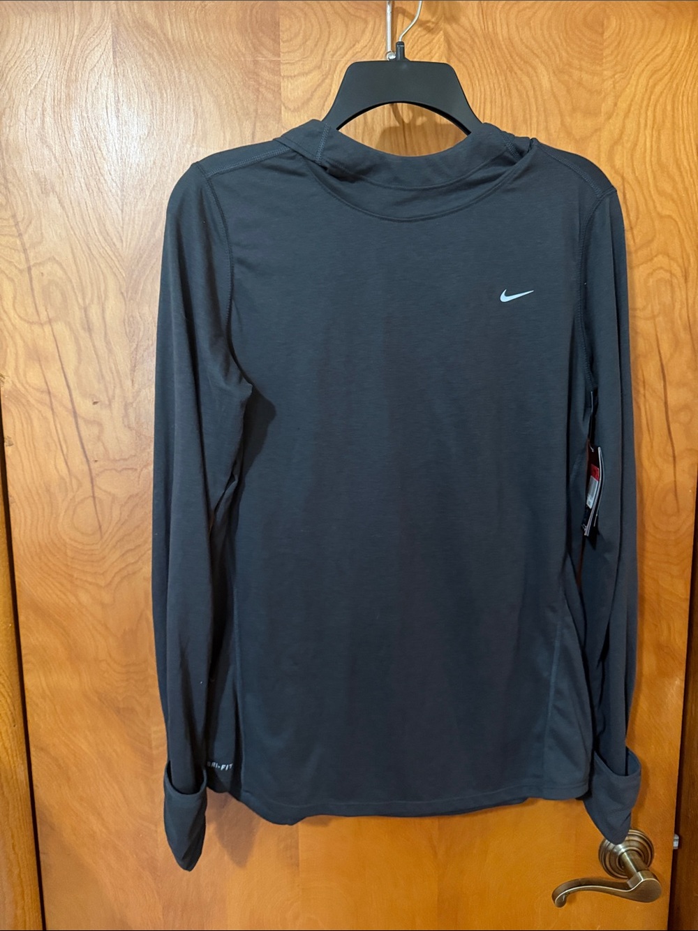 Nike women’s charcoal gray Long-Sleeve Dri-FIT Workout hoodie size large NWT